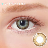Best Korean Colored Contact Lenses - Sunflower Brown Colored Contacts (1 Pair) /  These brown contact lenses with a hazel-brown pattern resembling a sunflower will give a natural and beautiful enlargement effect to dark brown eyes and a unique effect to bright eyes. and the chocolate limbal ring and graphic diameter of 13.5 mm will enlarge your pupils a little more and make them more attractive.  / Prescription and non-prescription available. Buy Colored Contact Lenses Online - EyeMellow